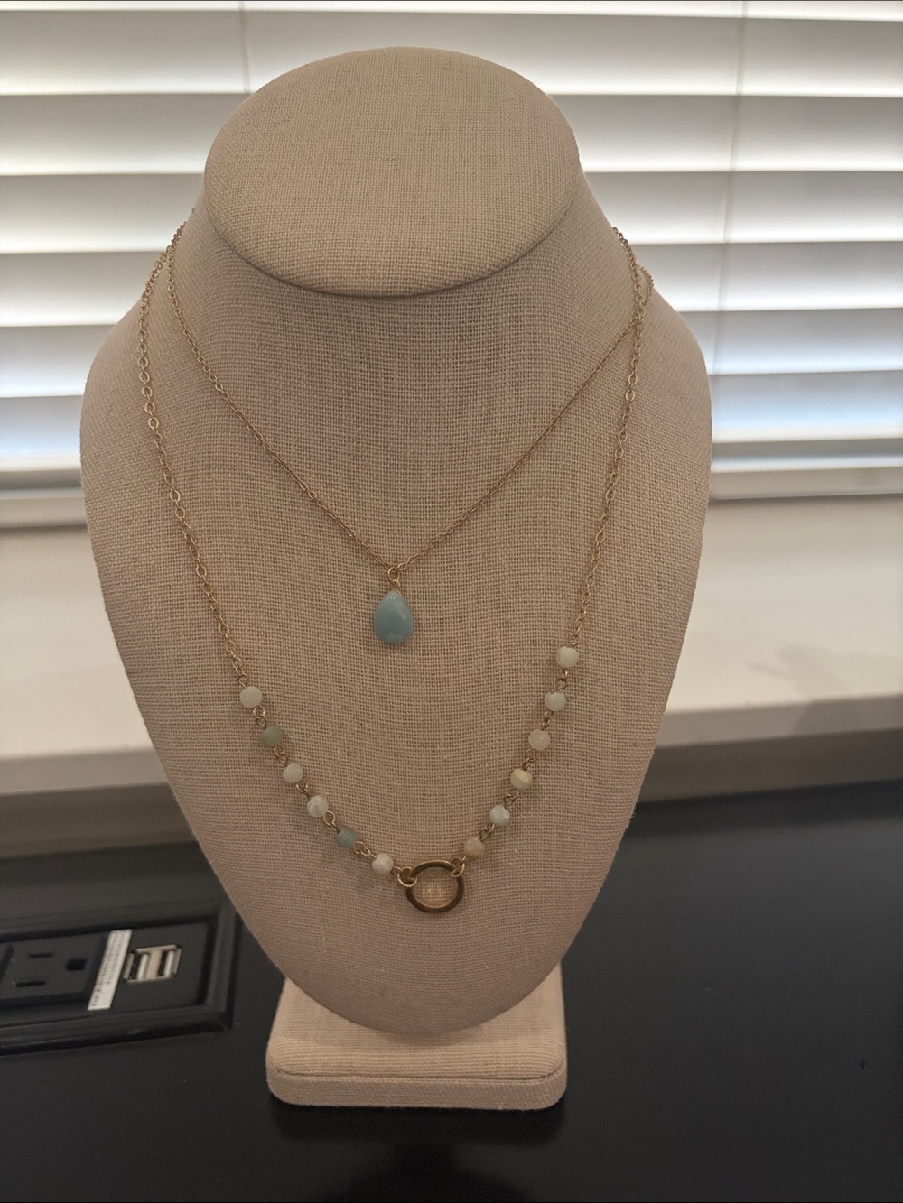 Gold Layered Necklace with Light Blue Teardrop Pendant